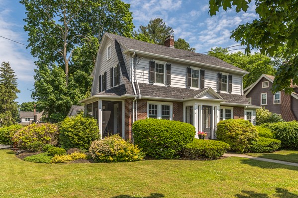 832 Webster Street Needham, MA 02492 - Photo 2 of 28 a front view of a house with a yard