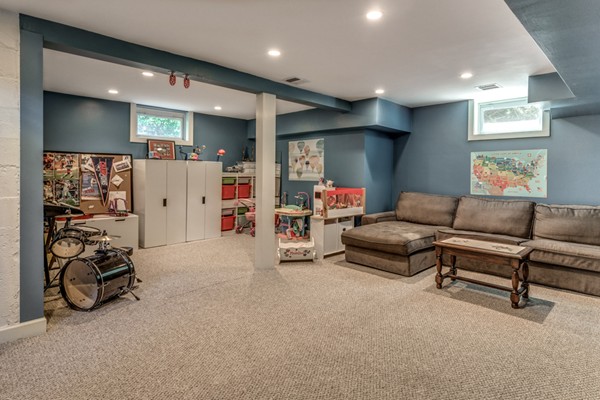 832 Webster Street Needham, MA 02492 - Photo 22 of 28 a living room with furniture and a flat screen tv