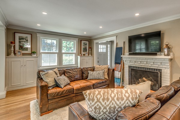 832 Webster Street Needham, MA 02492 - Photo 8 of 28 a living room with furniture fireplace and flat screen tv