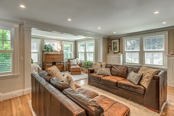 832 Webster Street Needham, MA 02492 - Photo 9 of 28 a living room with furniture and large windows