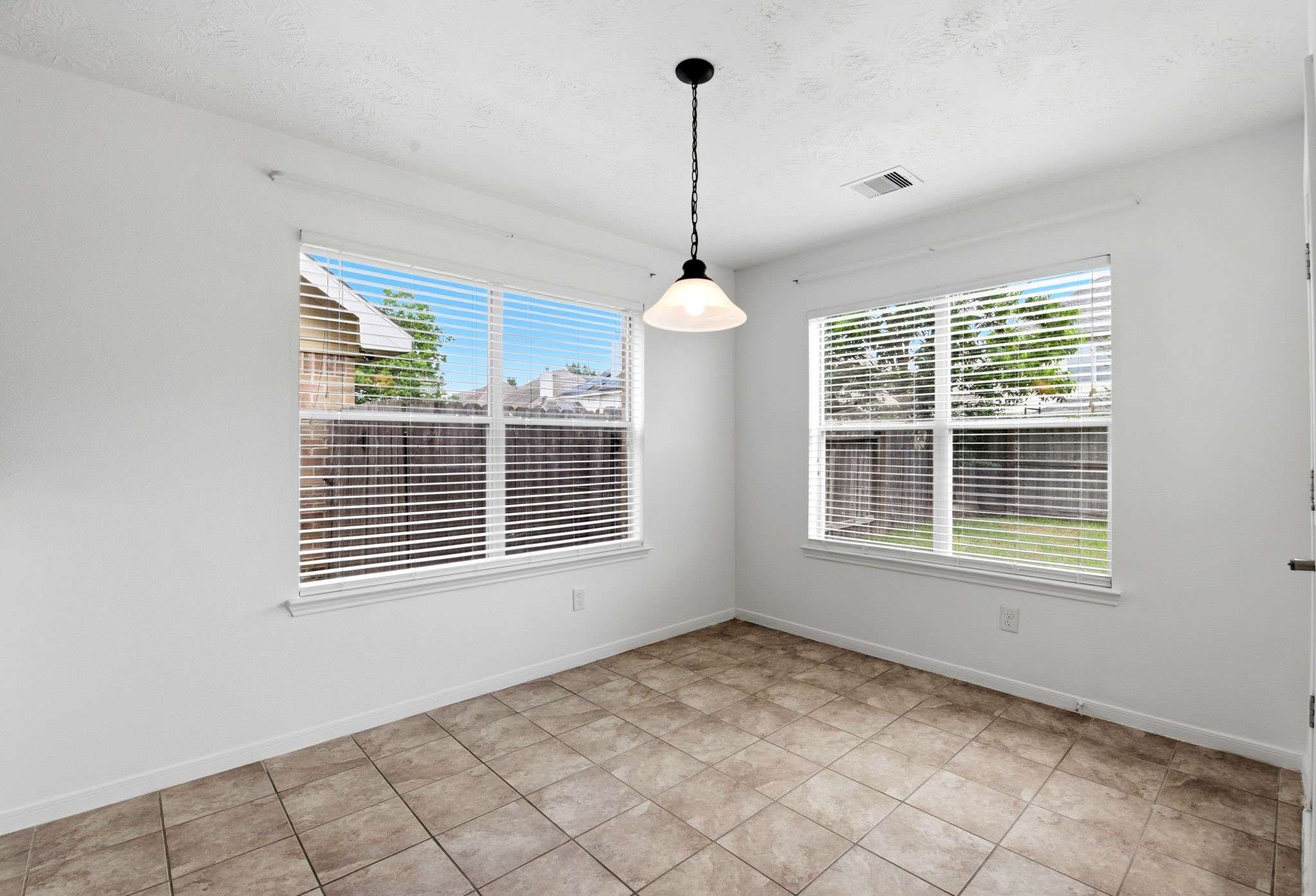 22102 Bridgestone Crossing Drive Spring, TX 77388 - Photo 12 of 38 a view of an empty room with a window