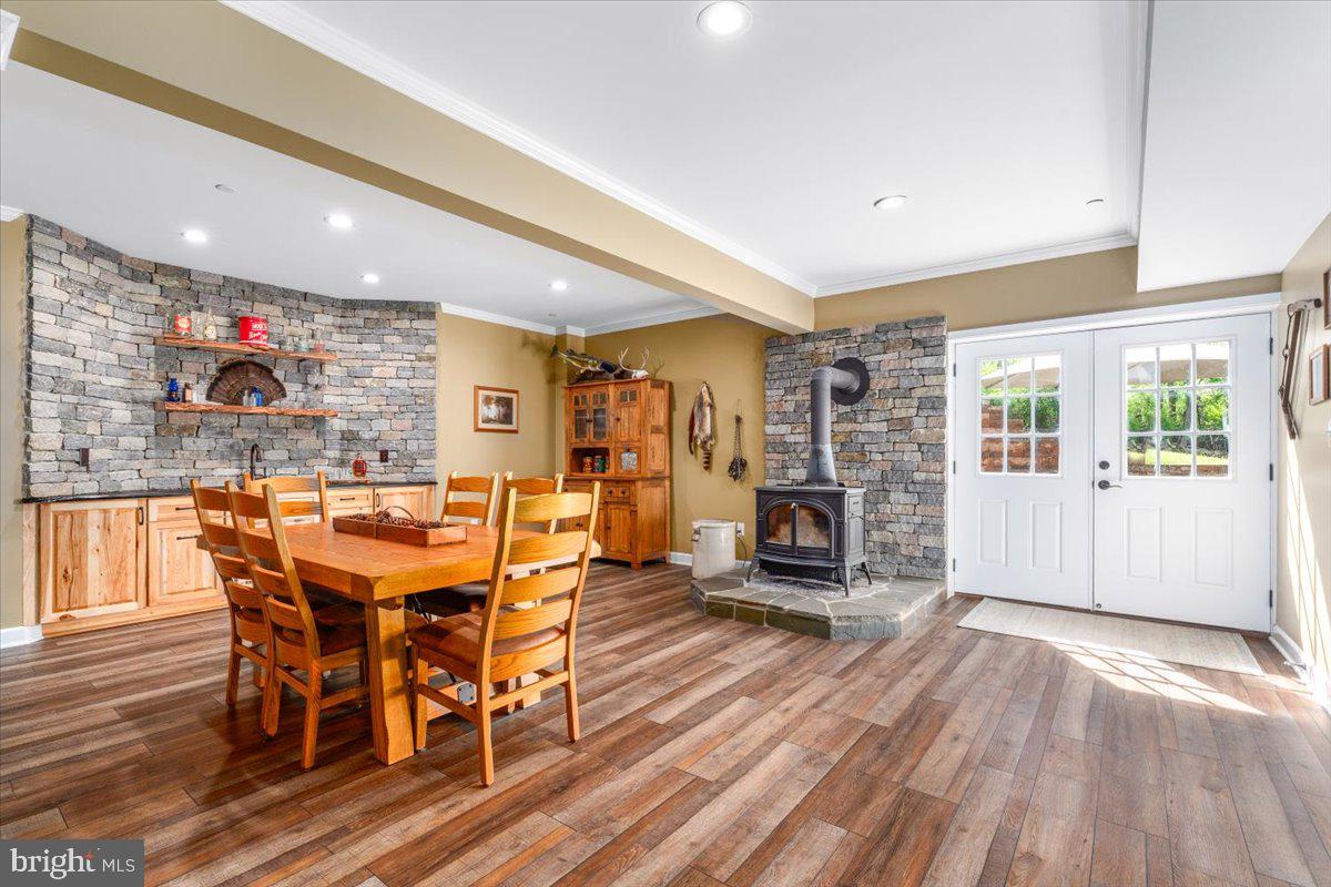 2802 Ward Kline Road Myersville, MD 21773 - Photo 47 of 85 Finished lower level with wood stove