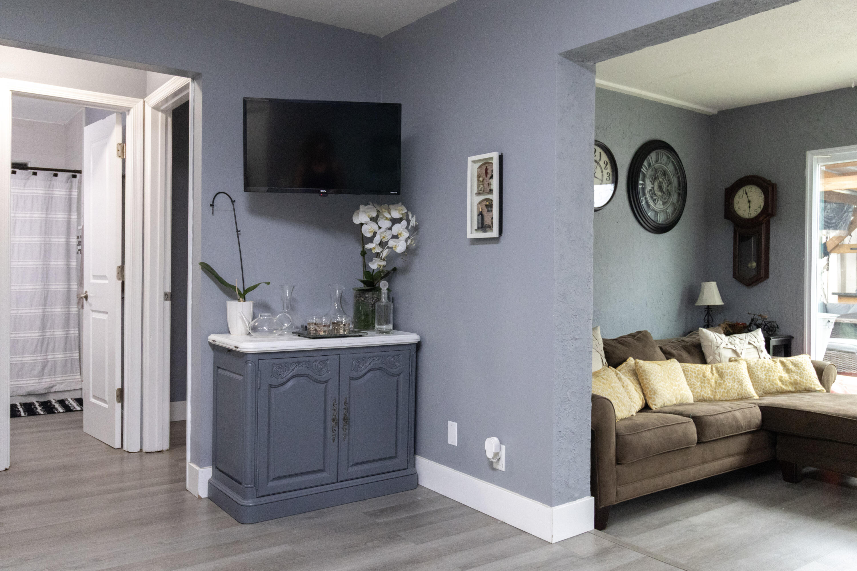 23287 Southwest 60th Avenue Boca Raton, FL 33428 - Photo 15 of 43 a living room with furniture and a flat screen tv