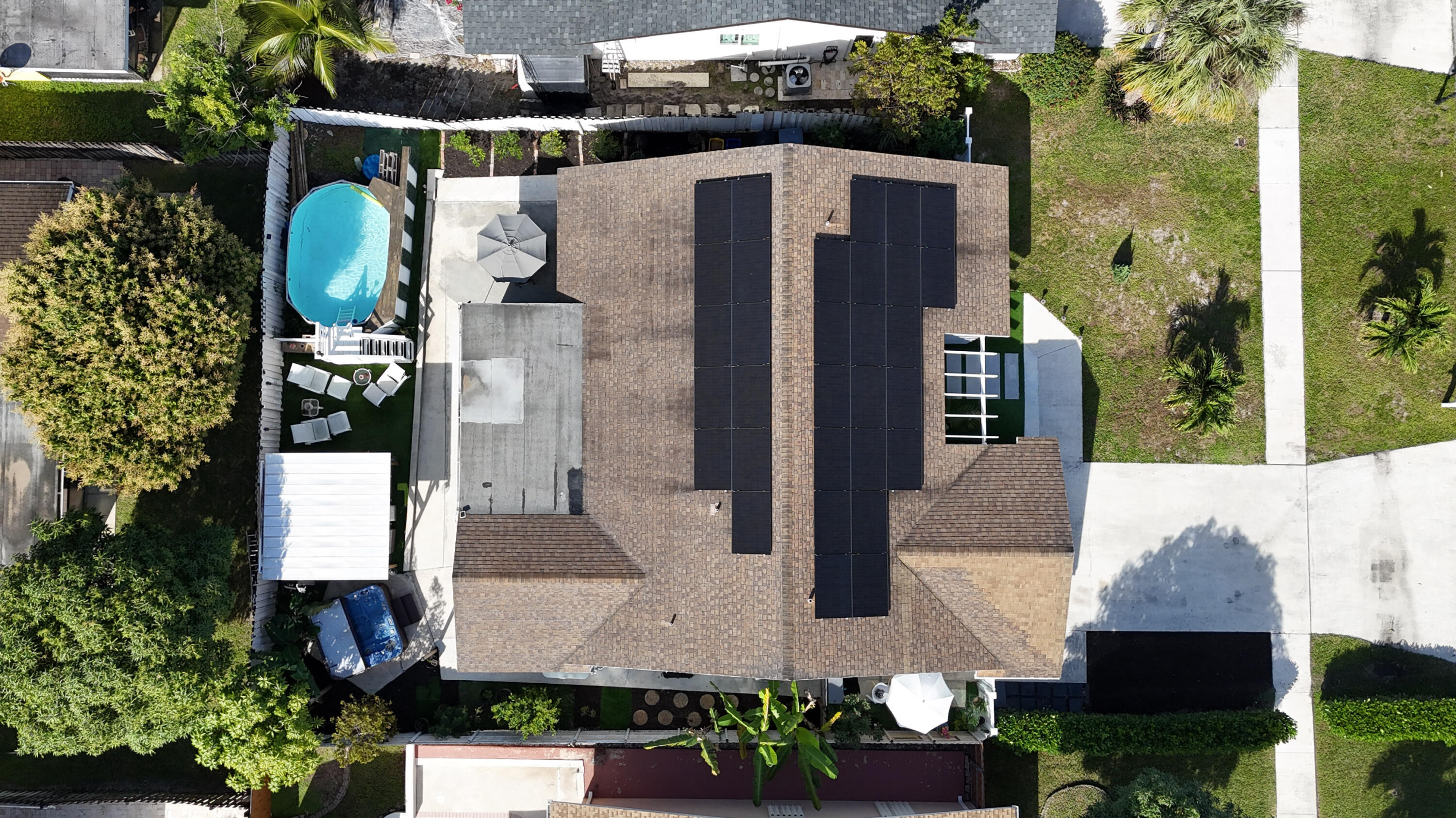 23287 Southwest 60th Avenue Boca Raton, FL 33428 - Photo 31 of 43 an aerial view of a house with a yard and large tree