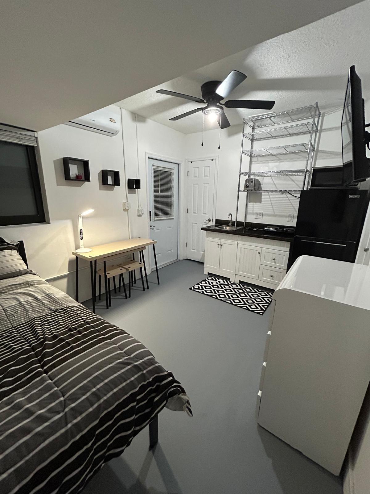 23287 Southwest 60th Avenue Boca Raton, FL 33428 - Photo 42 of 43 a very nice looking room with a bed