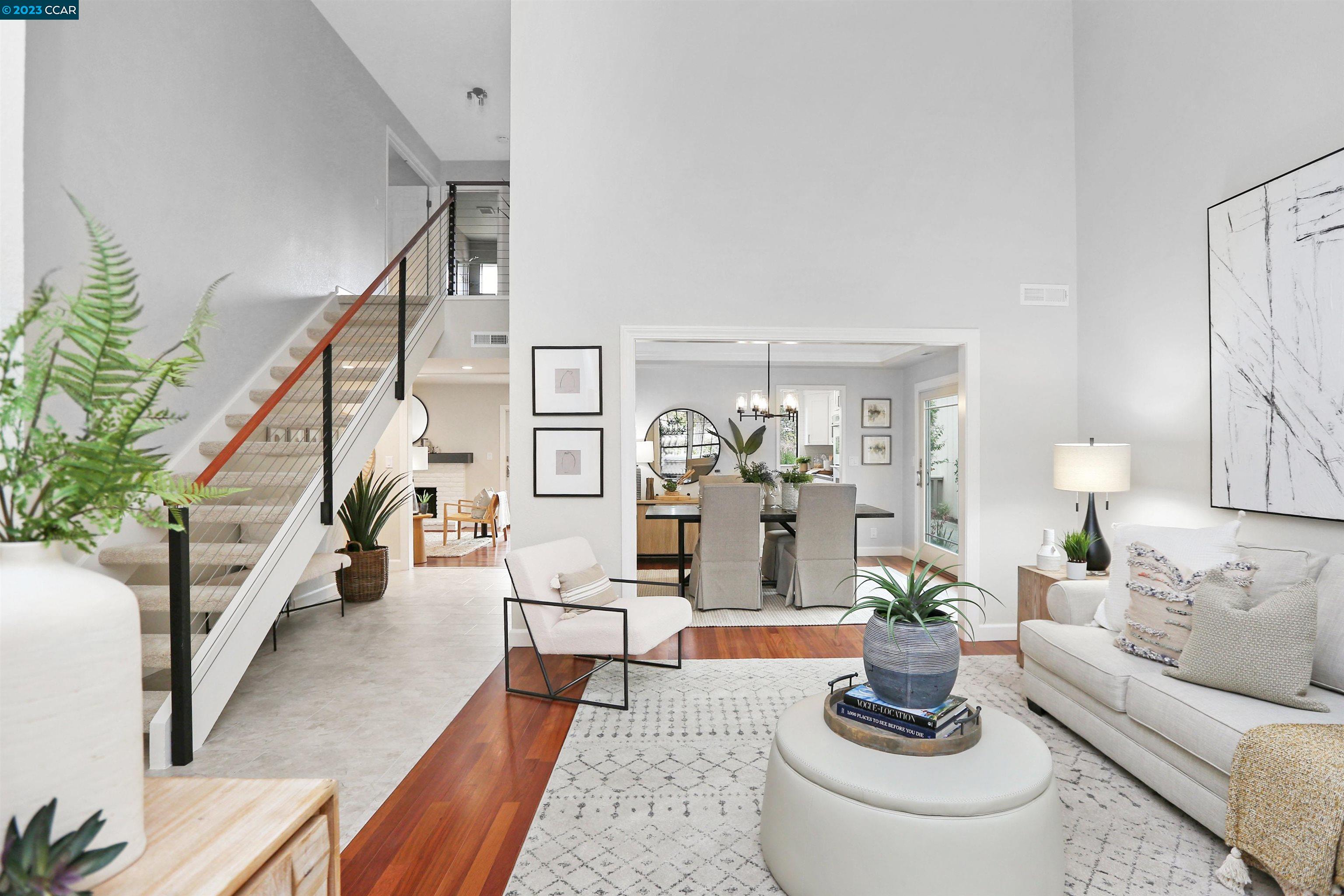 540 Adirondack Way Walnut Creek, CA 94598 - Photo 1 of 1 a living room with furniture and a chandelier