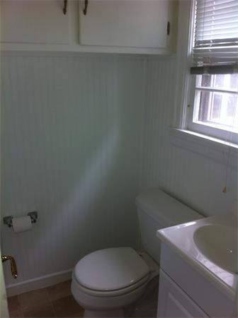 17 Dana Street Springfield, MA 01104 - Photo 7 of 12 a bathroom with a toilet and a window
