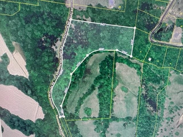 0 Raymond McAnally Road Savannah, TN 38372 - Photo 5 of 5 an aerial view of houses with yard