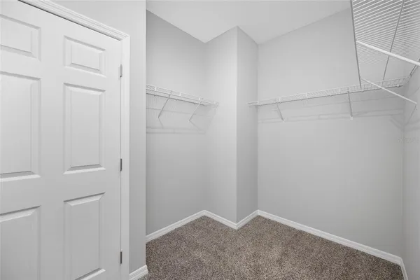 a view of an empty walk in closet
