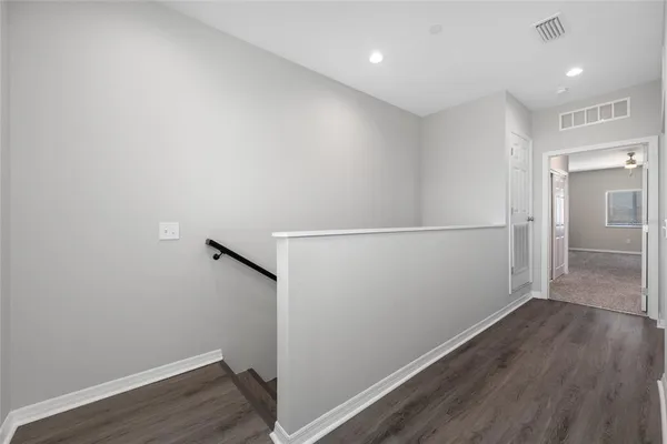 a view of small space with wooden floor