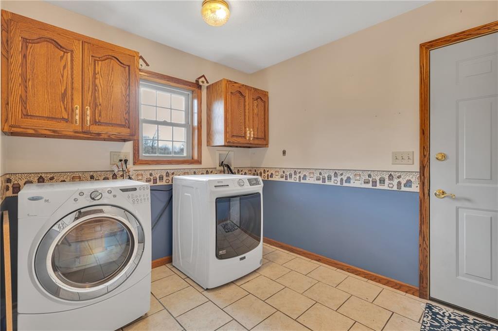 824 Old Millcreek Road Hookstown, PA 15050 - Photo 29 of 35 a utility room with sink dryer and washer