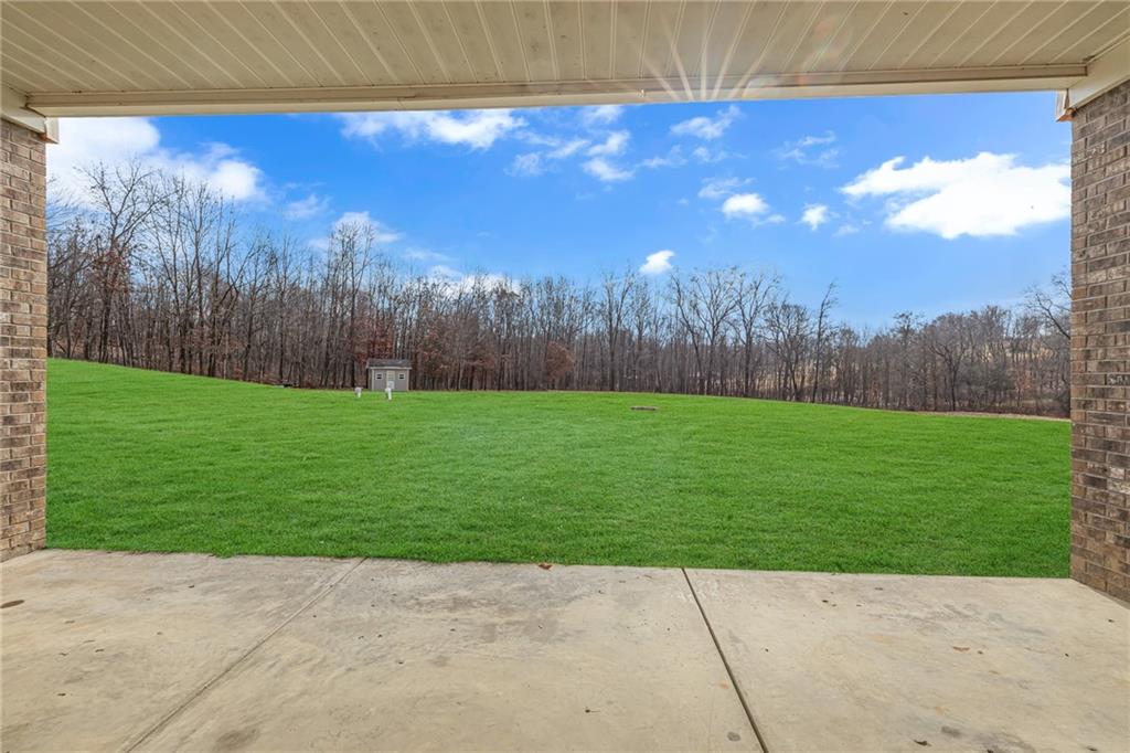 824 Old Millcreek Road Hookstown, PA 15050 - Photo 31 of 35 a view of a backyard with an umbrella