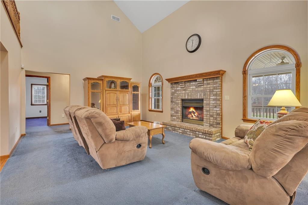 824 Old Millcreek Road Hookstown, PA 15050 - Photo 8 of 35 a living room with furniture and a fireplace