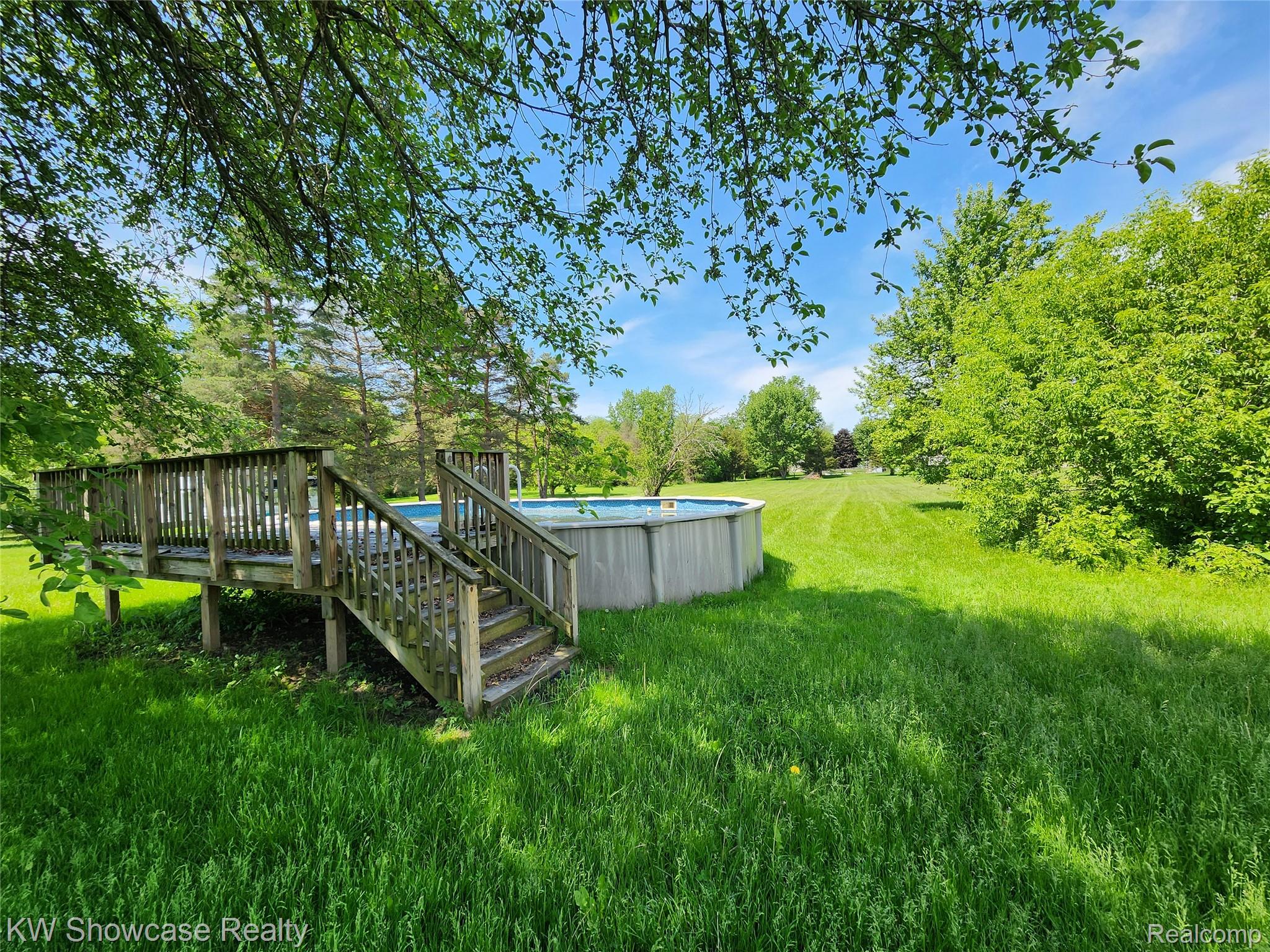 4356 South Vassar Road Burton, MI 48519 - Photo 5 of 42 Above ground outdoor pool.