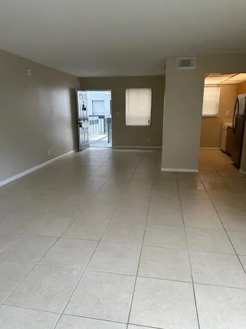 a view of livingroom with workspace