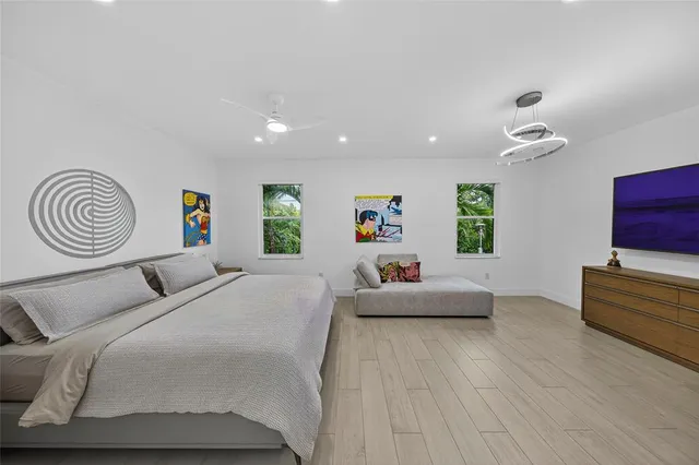 a bedroom with a bed and furniture