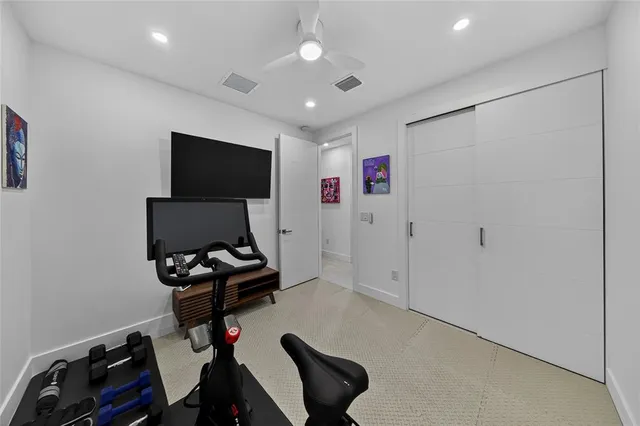 a room with furniture and flat screen tv