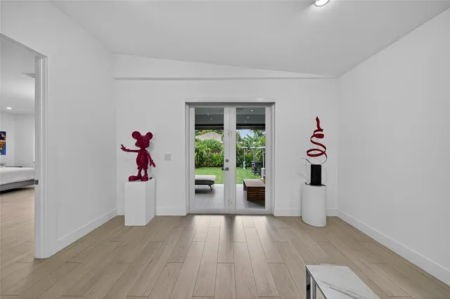 a view of a patio with couches chairs and a yard