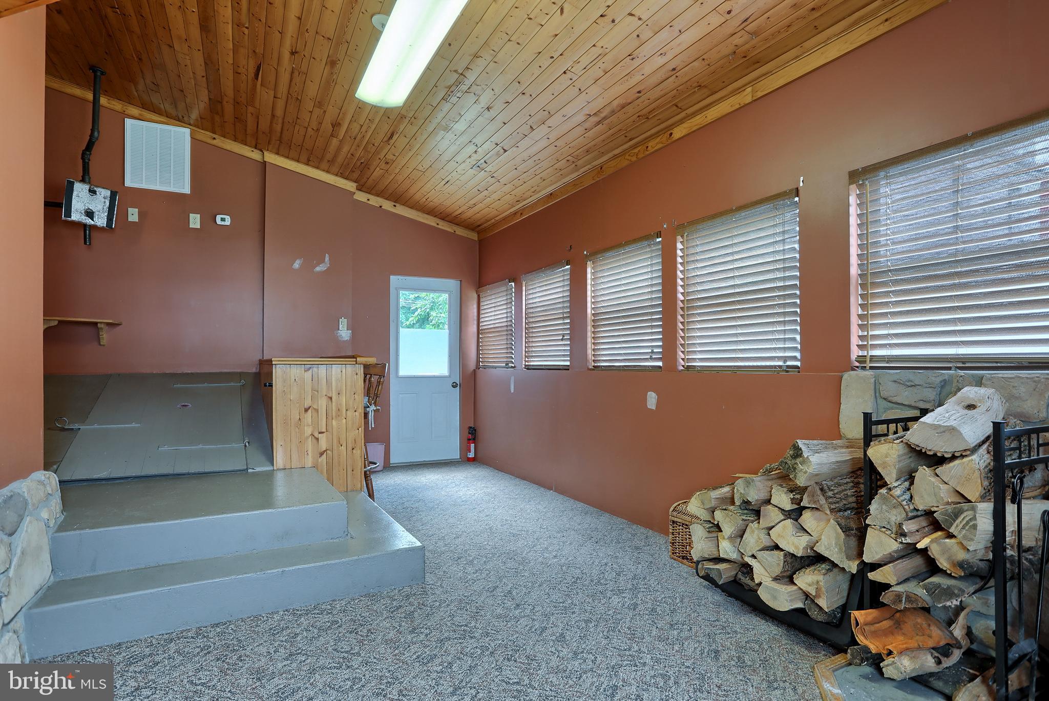 114 Anthracite Road Lebanon, PA 17042 - Photo 14 of 30 Family room with bar and wood stove