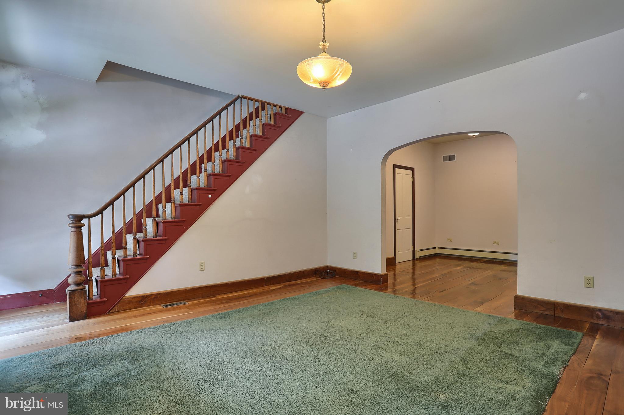 114 Anthracite Road Lebanon, PA 17042 - Photo 3 of 30 Living room with hare wood, open staircase