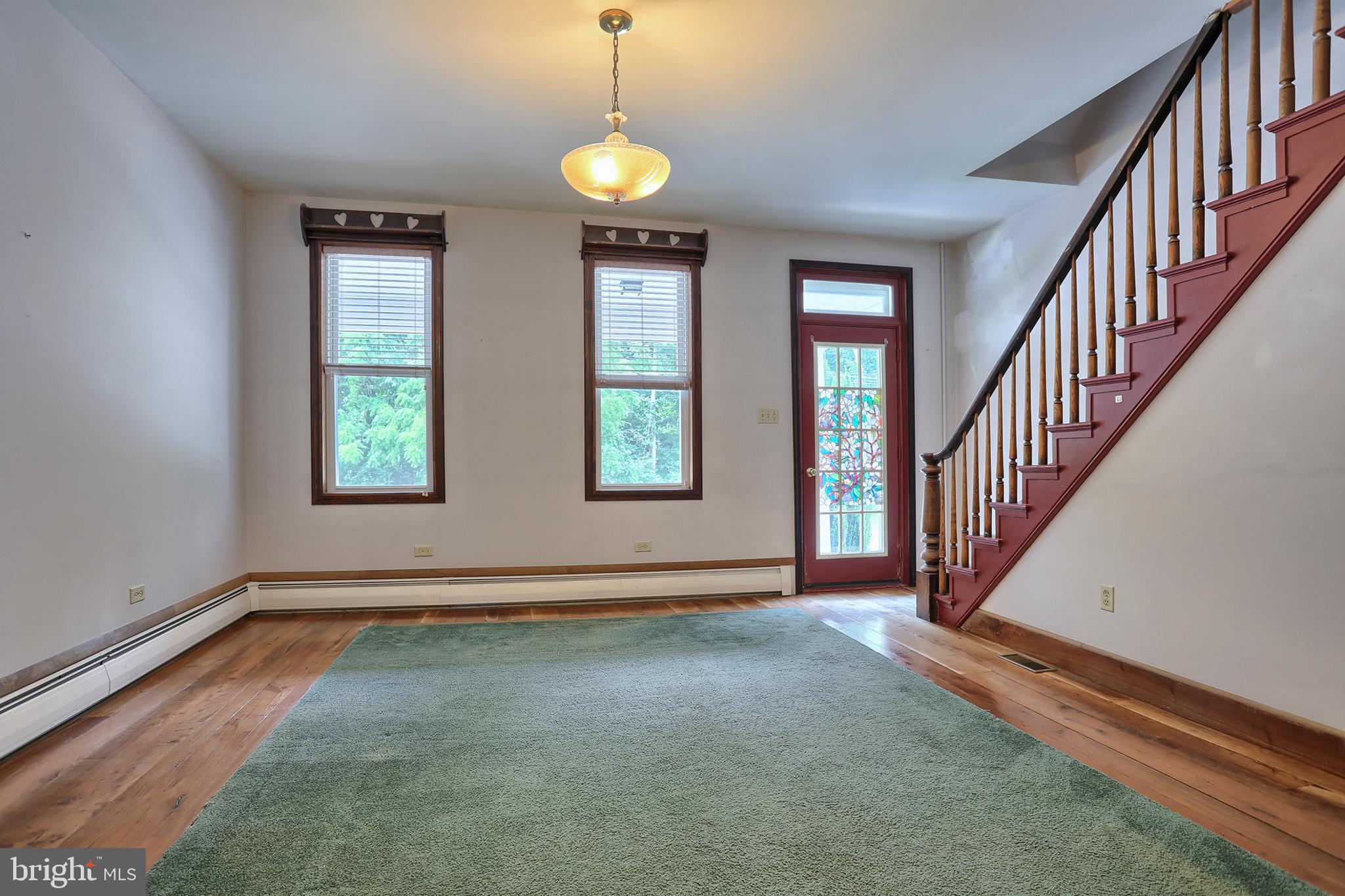 114 Anthracite Road Lebanon, PA 17042 - Photo 4 of 30 Living room wood with wood and in layed carpeting