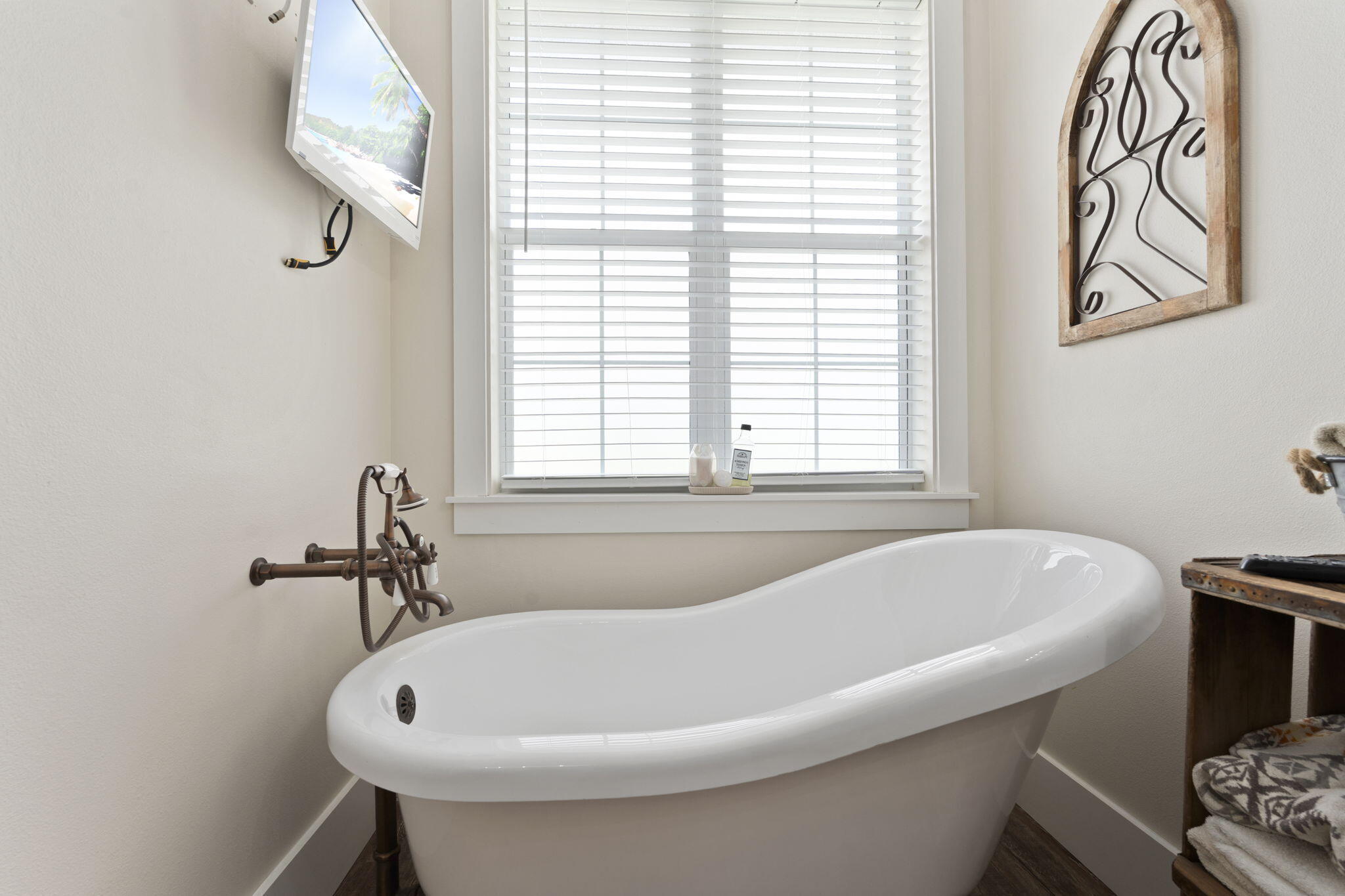 1720 South Brocksmith Road Fort Pierce, FL 34945 - Photo 27 of 53 a white bath tub sitting next to a window