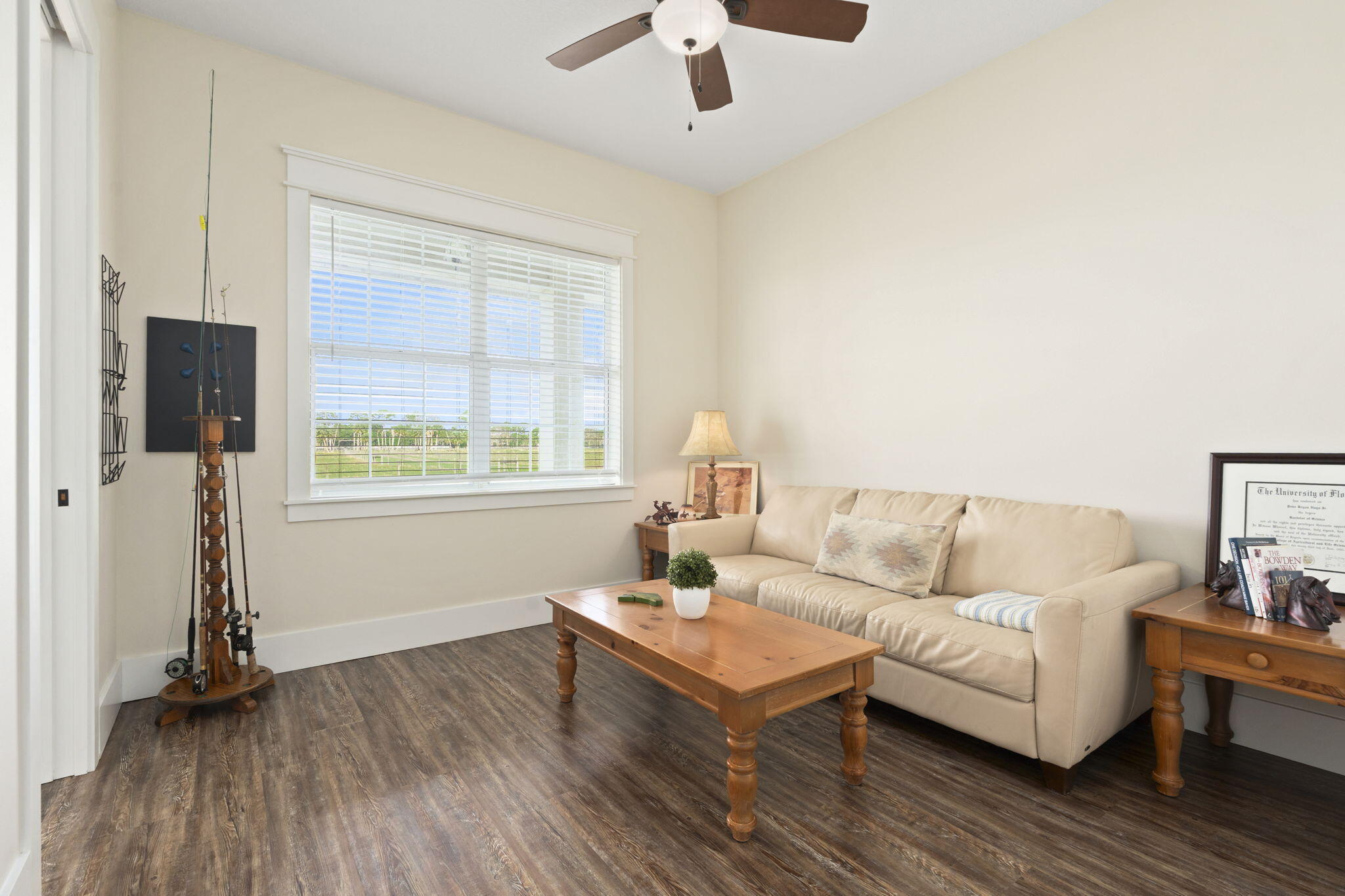 1720 South Brocksmith Road Fort Pierce, FL 34945 - Photo 33 of 53 a living room with furniture and a window