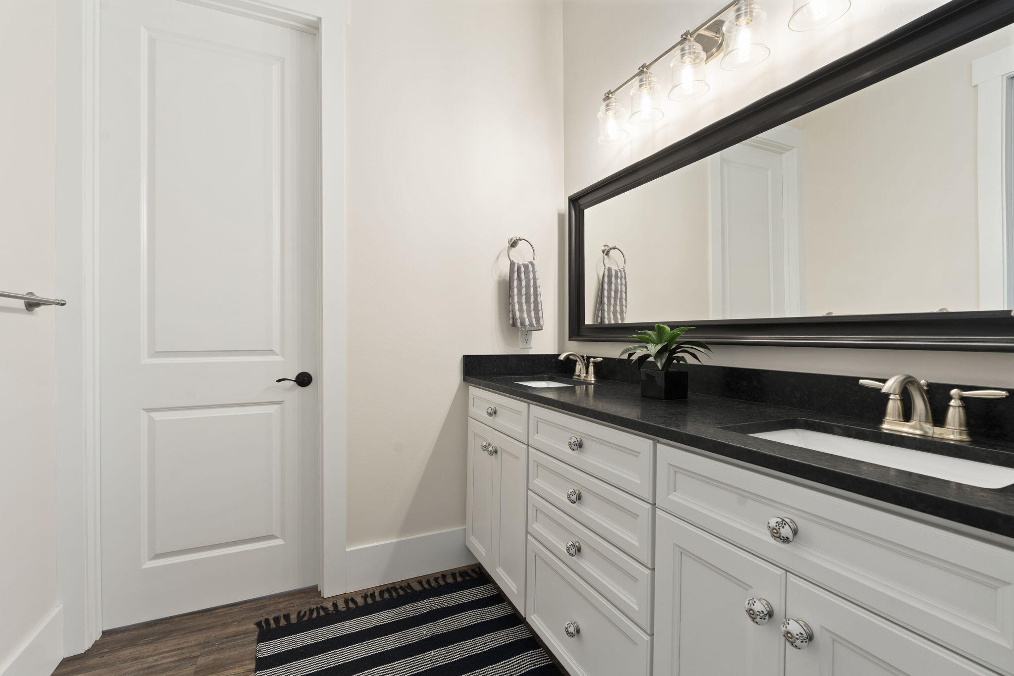 1720 South Brocksmith Road Fort Pierce, FL 34945 - Photo 34 of 53 a bathroom with a sink and a mirror