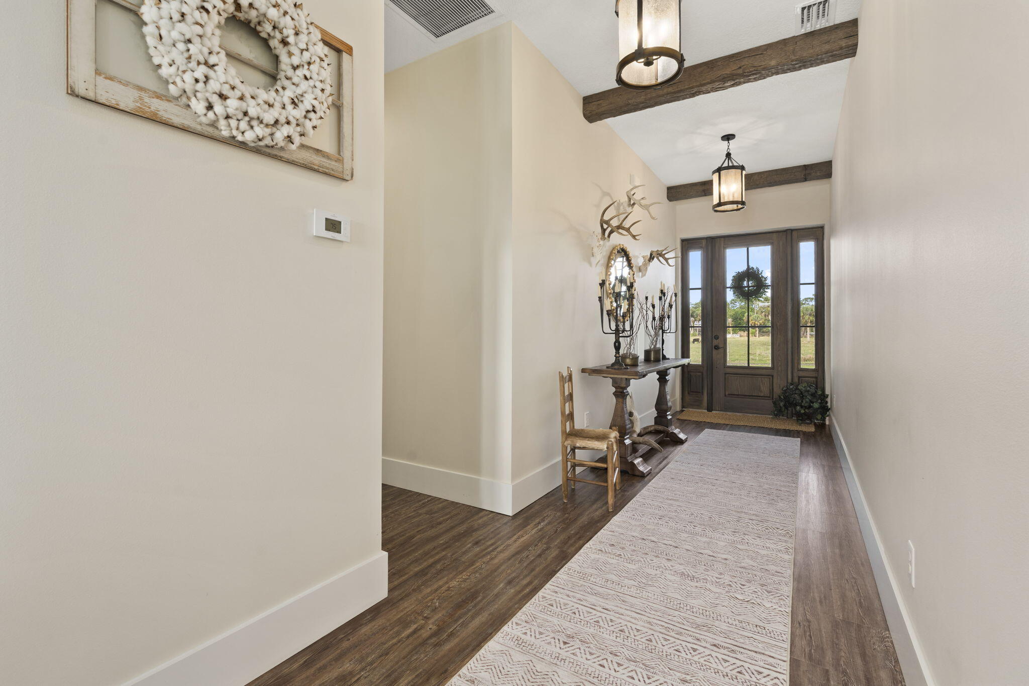 1720 South Brocksmith Road Fort Pierce, FL 34945 - Photo 36 of 53 wooden floor in a gallery