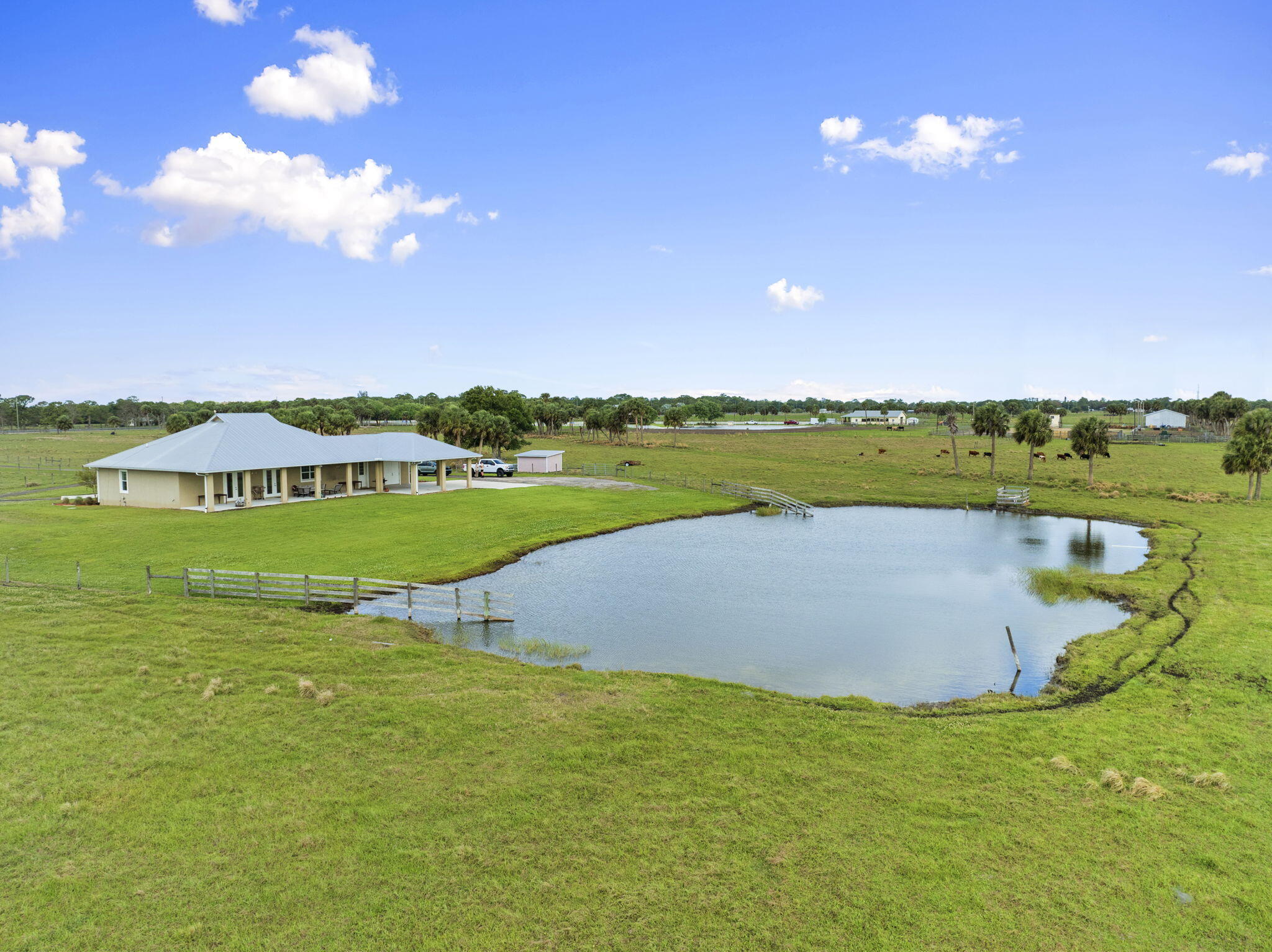 1720 South Brocksmith Road Fort Pierce, FL 34945 - Photo 47 of 53 a view of a golf course with a swimming pool