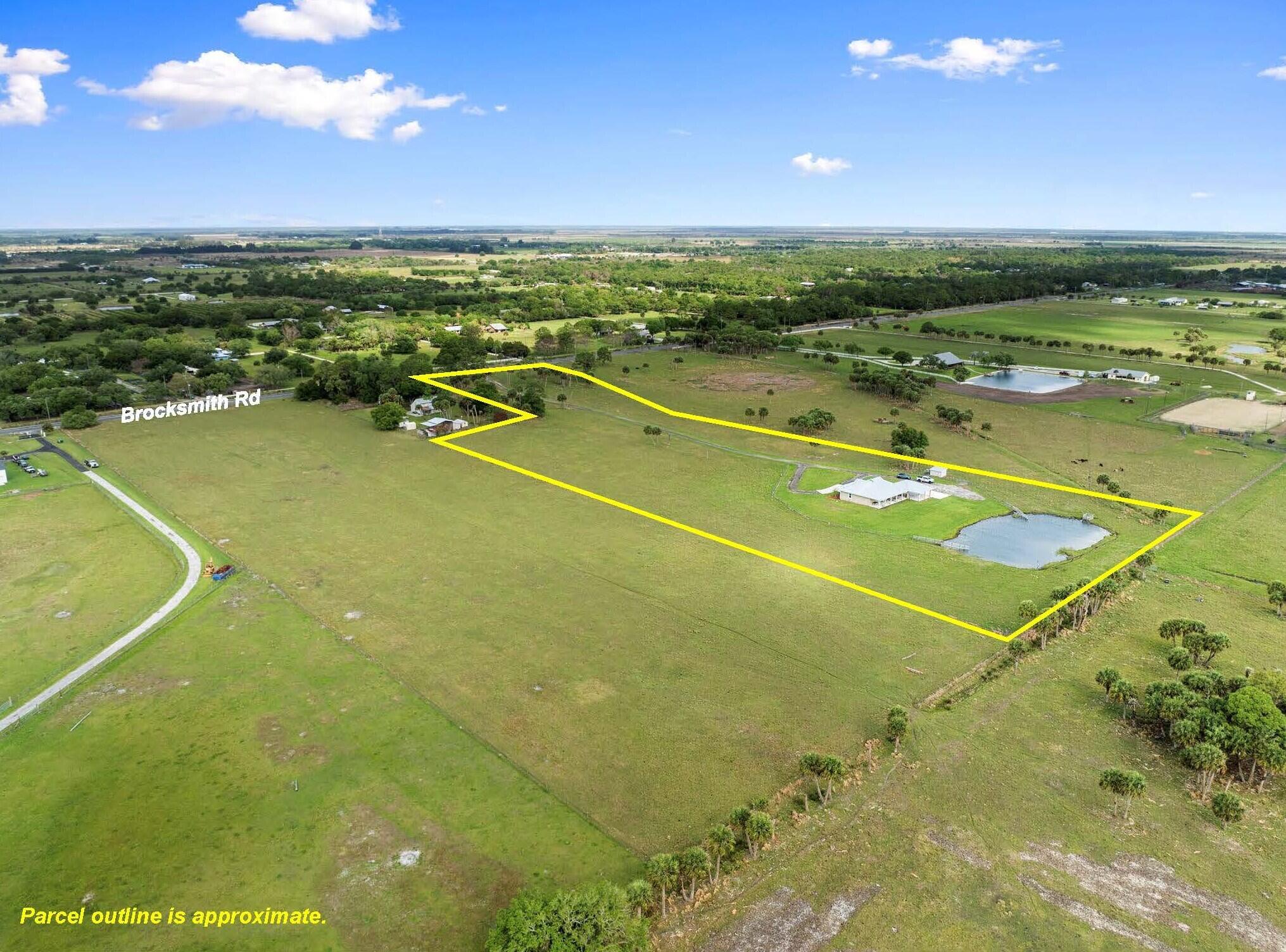 1720 South Brocksmith Road Fort Pierce, FL 34945 - Photo 49 of 53 a view of an outdoor space and tennis court
