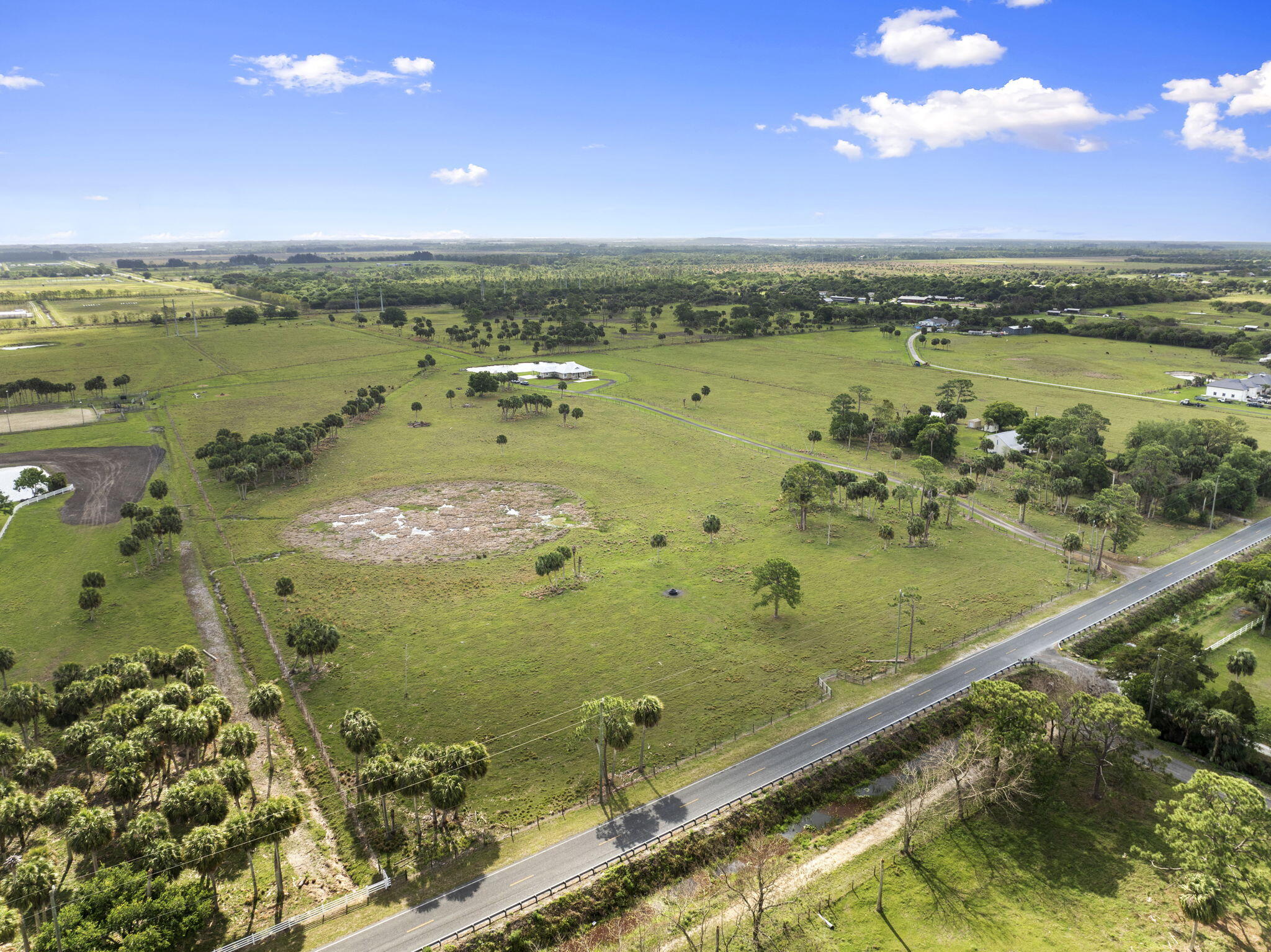 1720 South Brocksmith Road Fort Pierce, FL 34945 - Photo 52 of 53 a view of a lake with a city