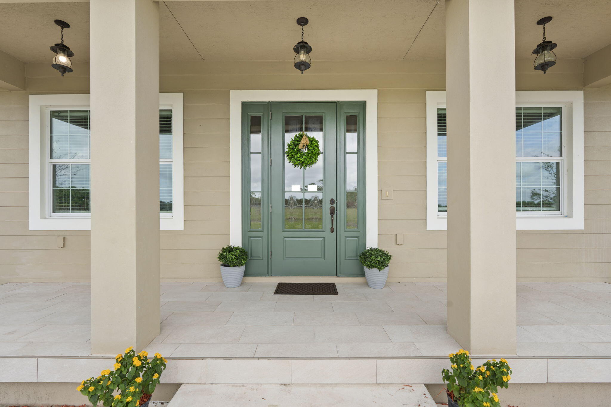 1720 South Brocksmith Road Fort Pierce, FL 34945 - Photo 7 of 53 a view of a glass door of the house
