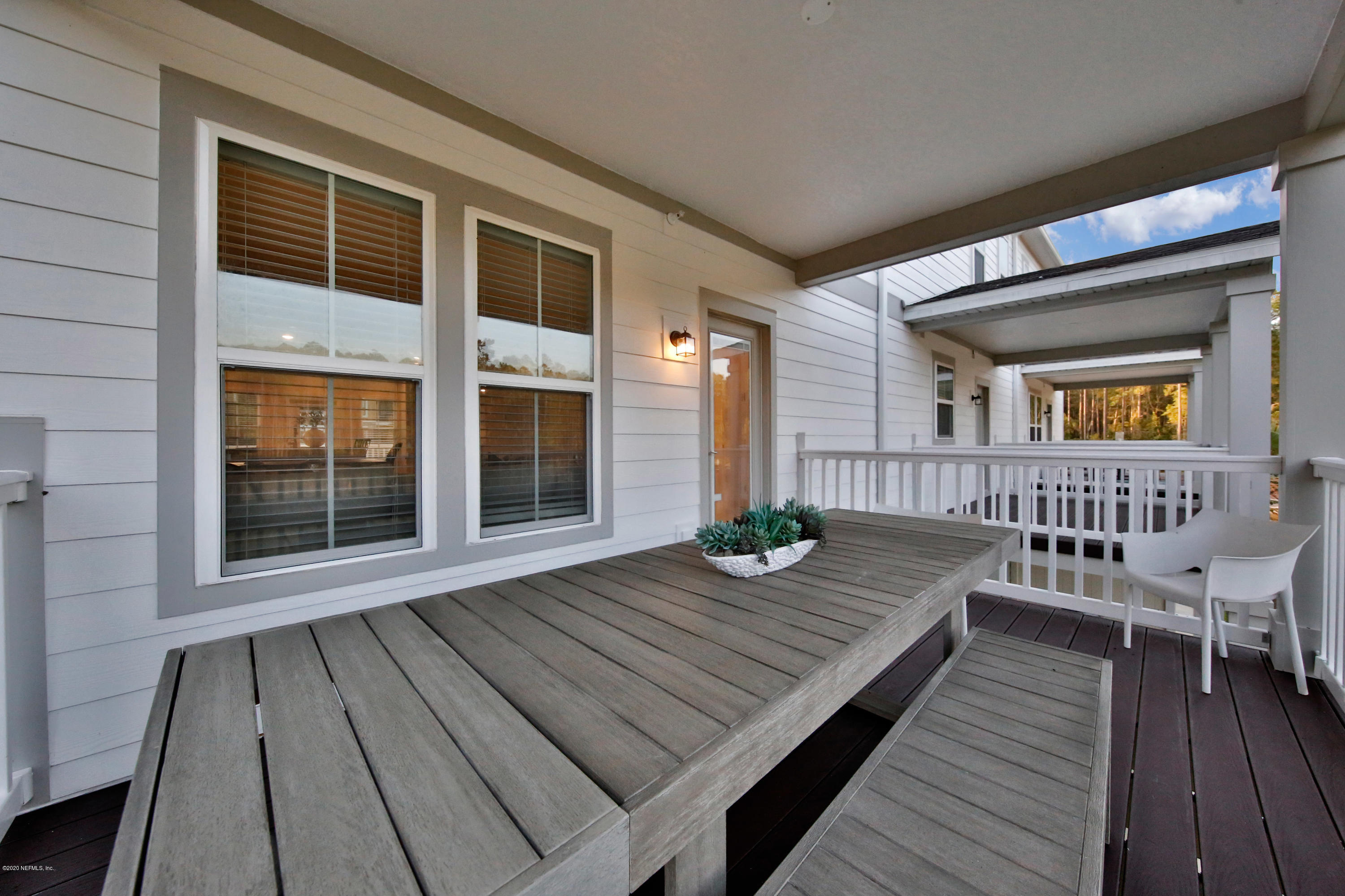 152 Spring Tide Way Ponte Vedra, FL 32081 - Photo 6 of 7 a view of deck with patio