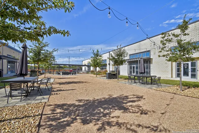 a view of a building with sitting area