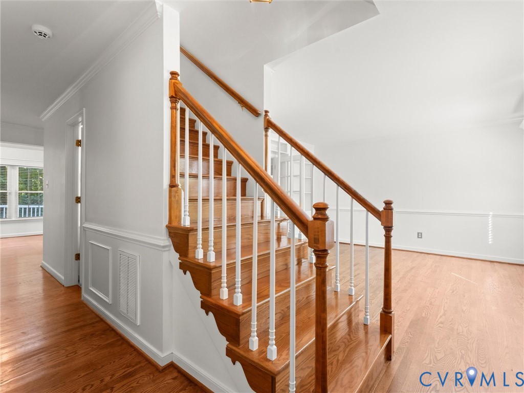 5904 Bent Creek Road Midlothian, VA 23112 - Photo 5 of 52 Hardwood flooring and staircase with white risers