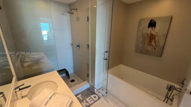 a living room with furniture and flowers