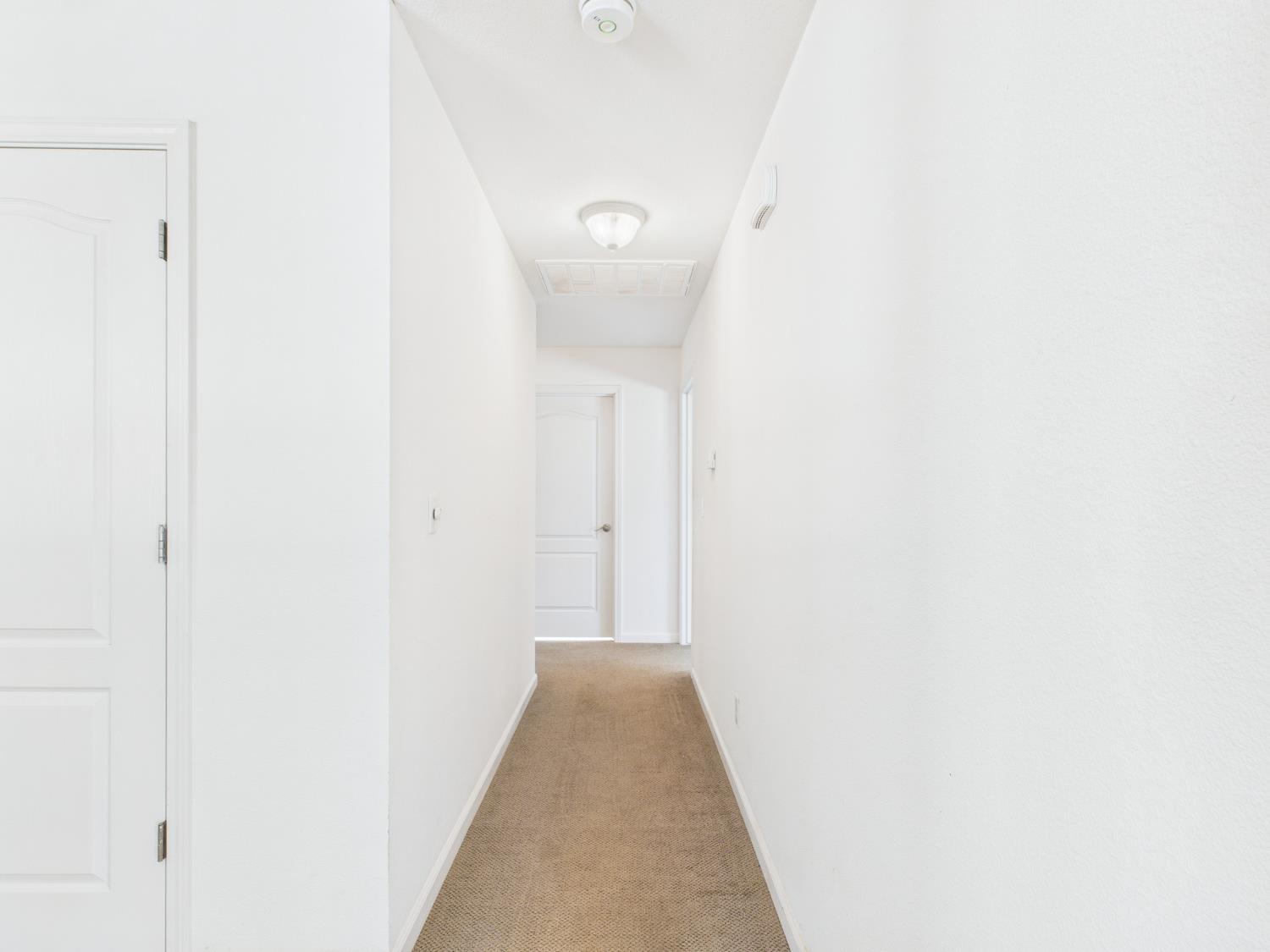 37550 Mountain Lakes Road Oakhurst, CA 93644 - Photo 23 of 63 a view of a hallway with closet