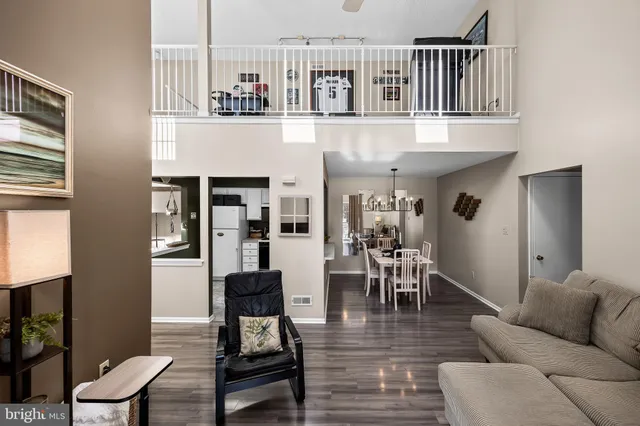 a bedroom with furniture and window
