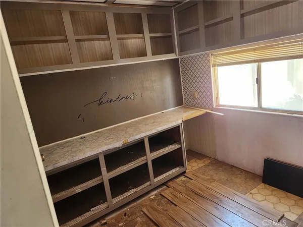 a bathroom with a sink and a washer dryer