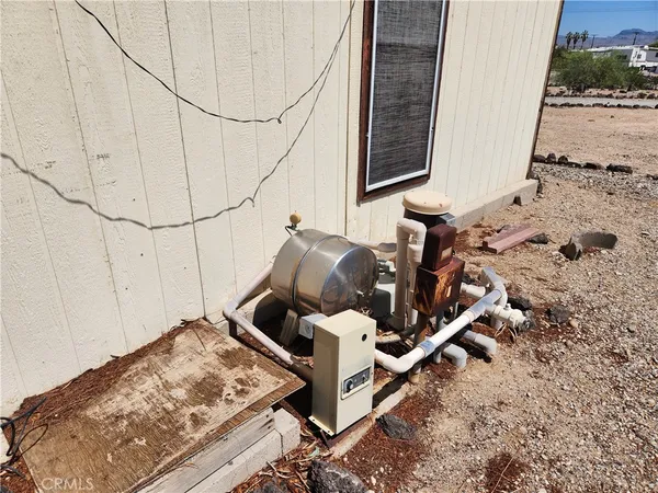 a view of a backyard of the house