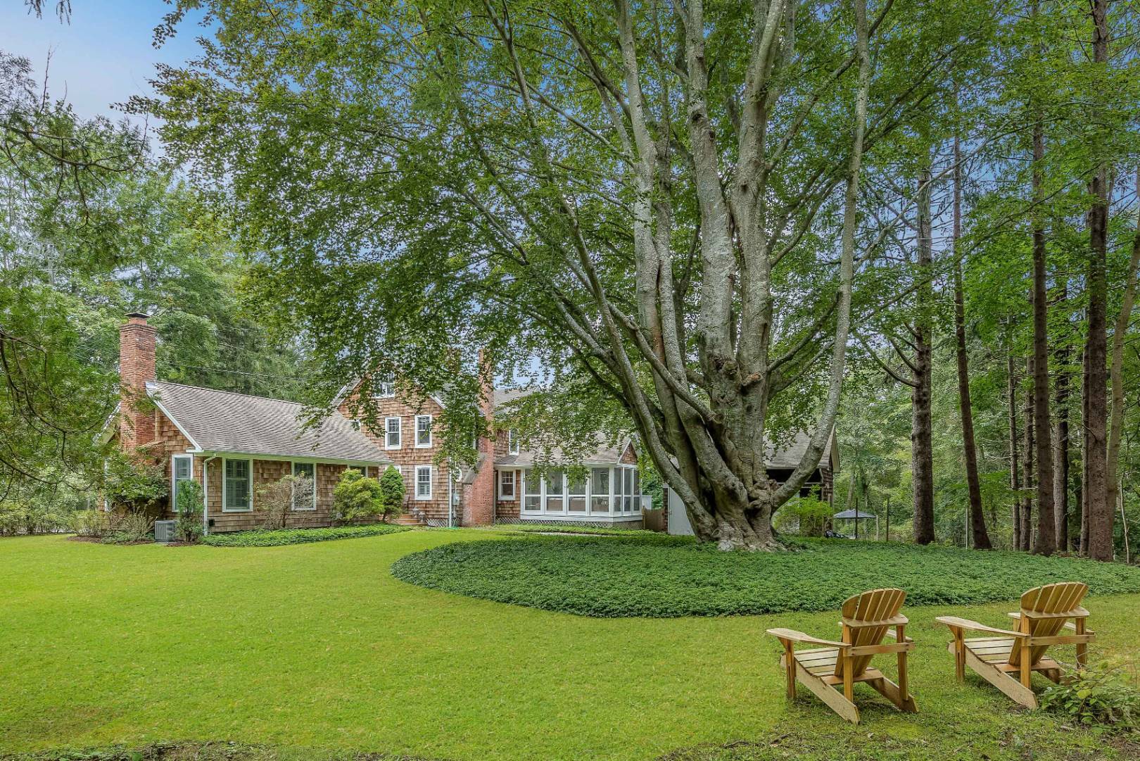 46 Maple Lane East Hampton, NY 11937 - Photo 21 of 21 a view of a house with a yard