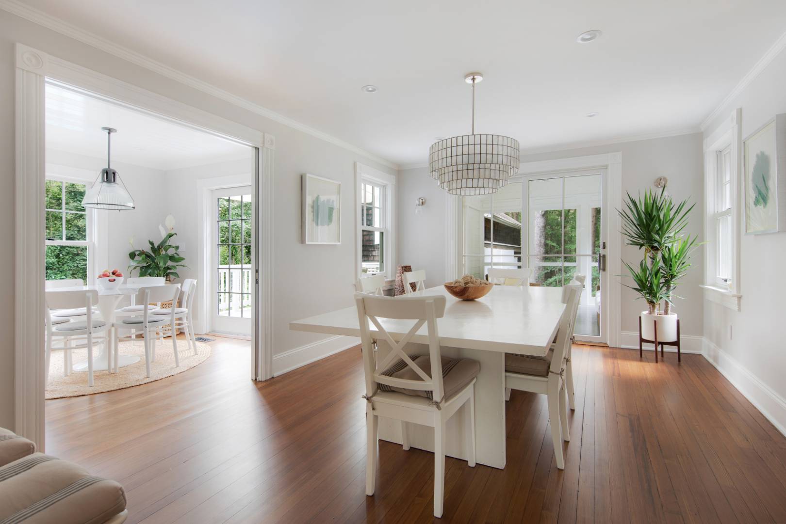 46 Maple Lane East Hampton, NY 11937 - Photo 4 of 21 a view of a dining room with furniture window and wooden floor