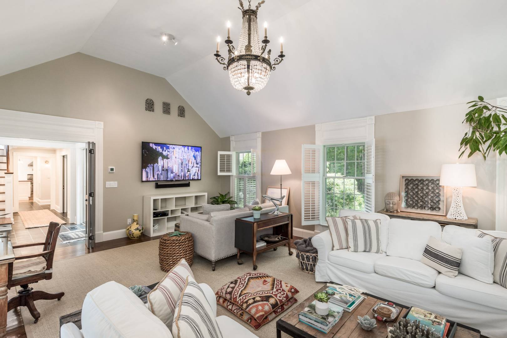 46 Maple Lane East Hampton, NY 11937 - Photo 7 of 21 a living room with furniture a window and a flat screen tv