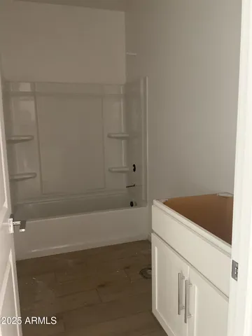 a bathroom with a bathtub