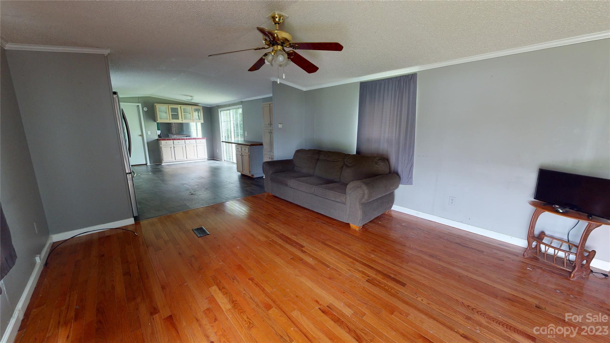 28 Thomas Lane Clyde, NC 28721 - Photo 2 of 9 a living room with furniture and a wooden floor
