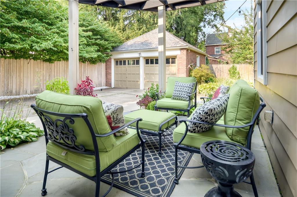 308 Maple Lane Sewickley, PA 15143 - Photo 4 of 25 a view of a chairs and table in the backyard