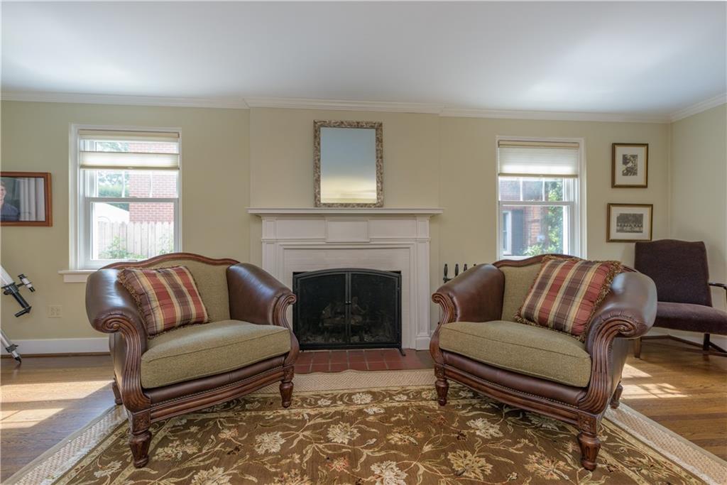 308 Maple Lane Sewickley, PA 15143 - Photo 8 of 25 a living room with furniture window and a fireplace