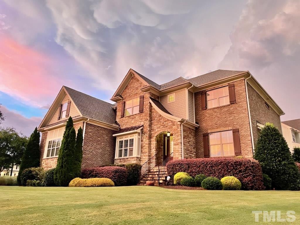 5100 Gansett Lane Raleigh, NC 27612 - Photo 1 of 39 a front view of a house with a yard