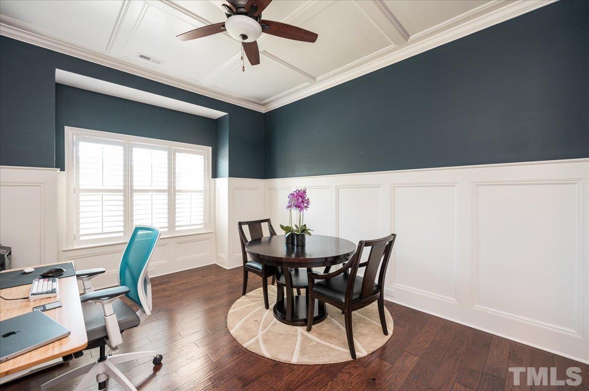 5100 Gansett Lane Raleigh, NC 27612 - Photo 14 of 39 a view of a dining room with furniture window and outside view